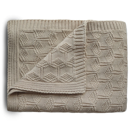 Coperta per culla Mushie a nido d'ape beige