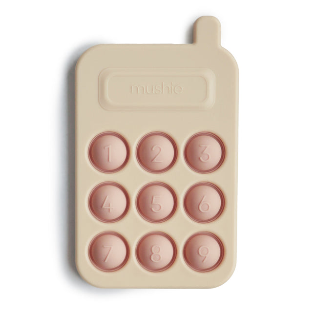 Mushie Giocattolo educativo Telefono a pressione Blush